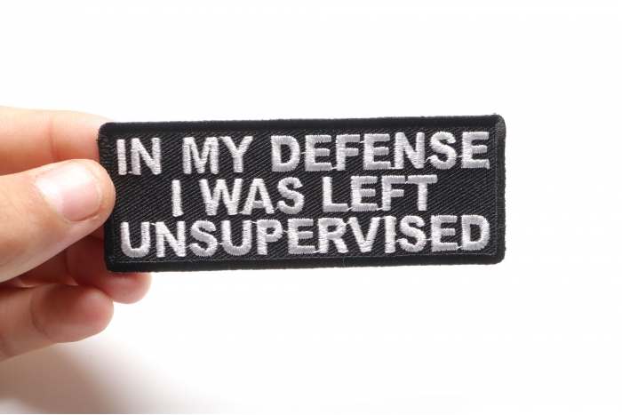 In My Defense I Was Left Unsupervised Funny Iron on Patch shown on hand for size comparison