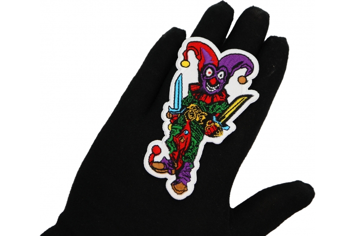 Jester Clown with Knives Patch shown on hand for size comparison
