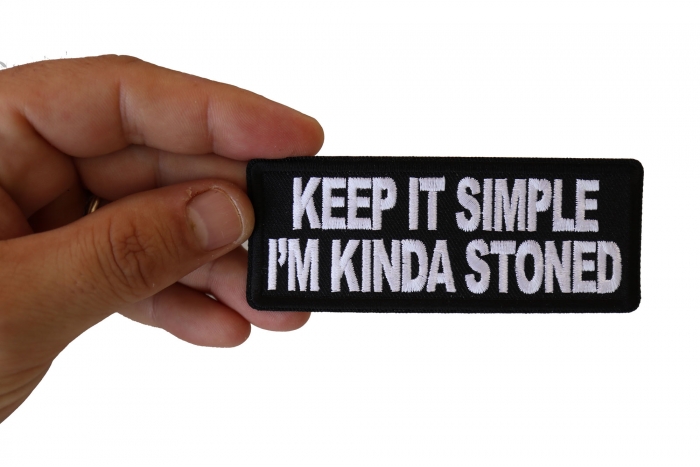 Keep It Simple I'm Kinda Stoned Funny Iron on Patch shown on hand for size comparison