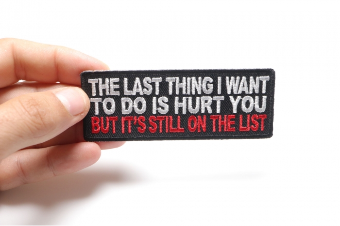 Last Thing I Want Is To Hurt You Funny Iron on Patch shown on hand for size comparison