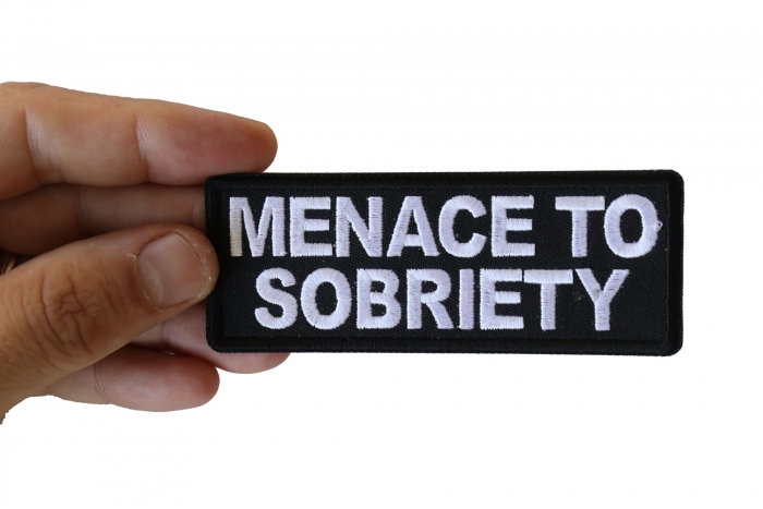 Menace to Sobriety Funny Iron on Patch shown on hand for size comparison