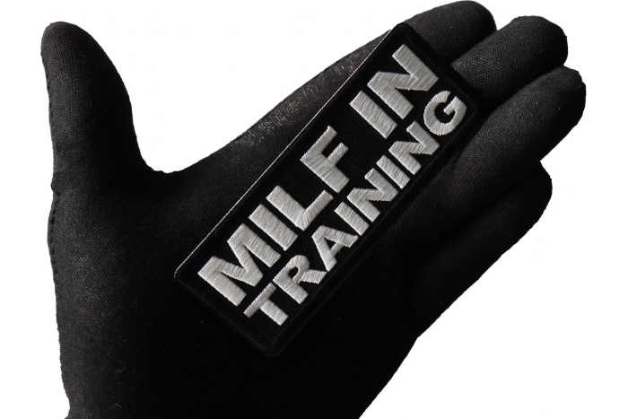 Milf in Training Funny Ladies Patch shown on hand for size comparison