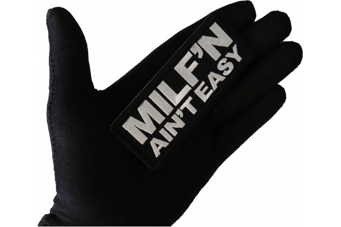 Milf'n ain't easy funny patch shown on hand for size comparison