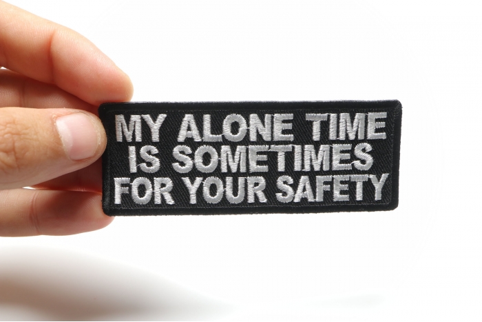 My Alone Time Is Sometimes For Your Safety Funny Iron on Patch shown on hand for size comparison