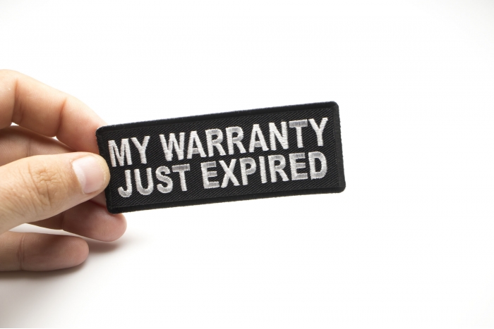 My Warranty Just Expired Funny Iron on Patch shown on hand for size comparison