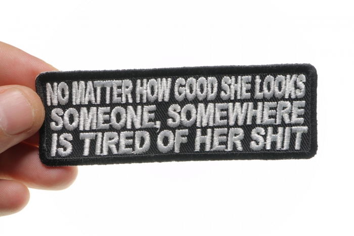 No Matter How Good She Looks Someone's Tired Of Her Shit Funny Iron on Patch shown on hand for size comparison