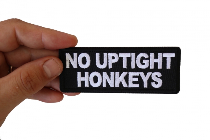 No Uptight Honkeys Funny Iron on Patch shown on hand for size comparison