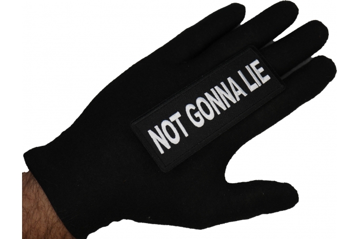 Not Gonna Lie Patch shown on hand for size comparison