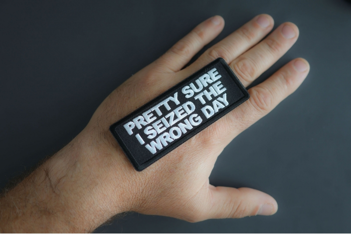 Pretty Sure I Seized The Wrong Day Patch shown on hand for size comparison