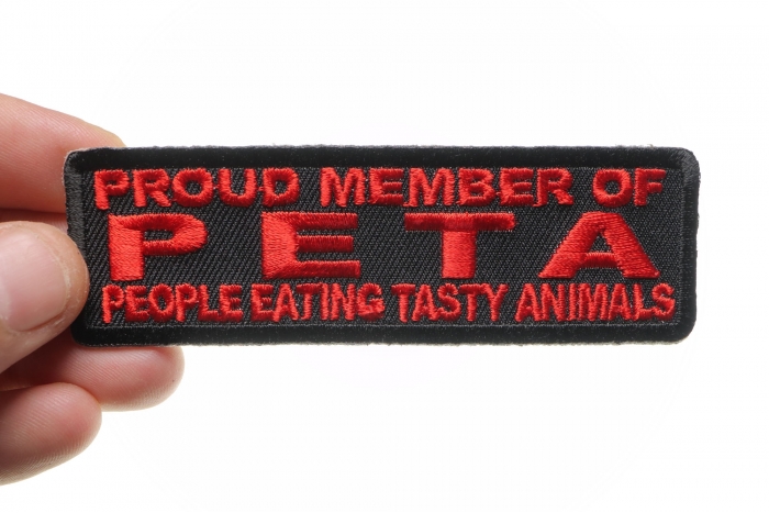 Proud Member Of Peta Funny Iron on Patch shown on hand for size comparison