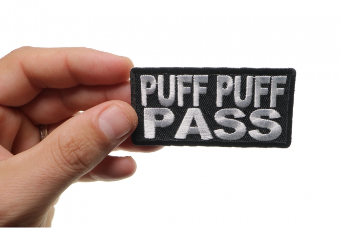 Puff Puff Pass Funny Iron on Patch shown on hand for size comparison