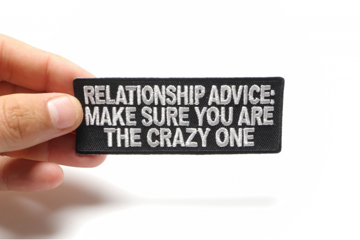 Relationship Advice Funny Iron on Patch shown on hand for size comparison