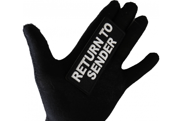 Return To Sender Funny Iron on Patch shown on hand for size comparison