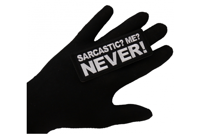 Sarcastic Me NEVER Funny Iron on Patch shown on hand for size comparison