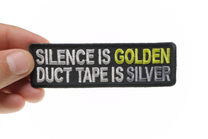 Silence Is Golden Duct Tape Is Silver Funny Iron on Patch shown on hand for size comparison