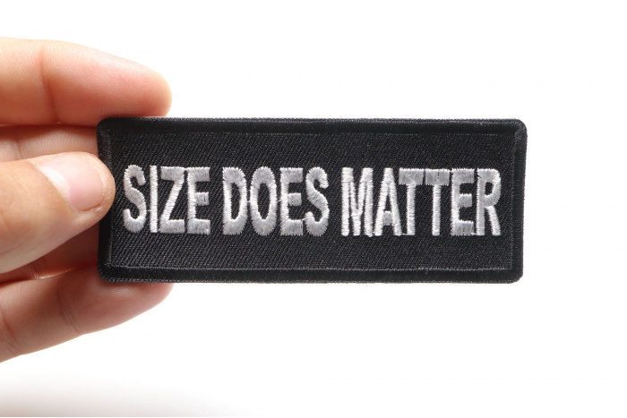 Size Does Matter Patch, Funny Patches for Ladies shown on hand for size comparison