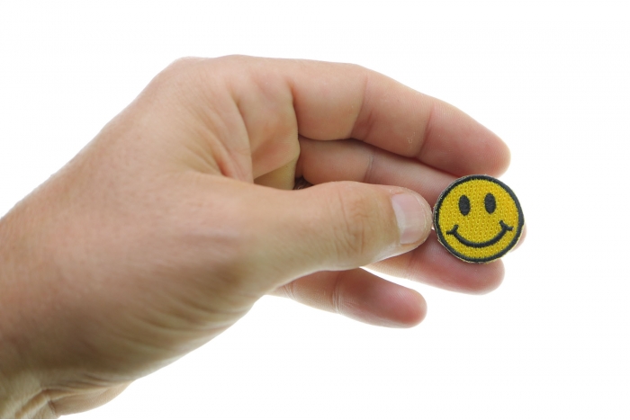  shown on hand for size comparison