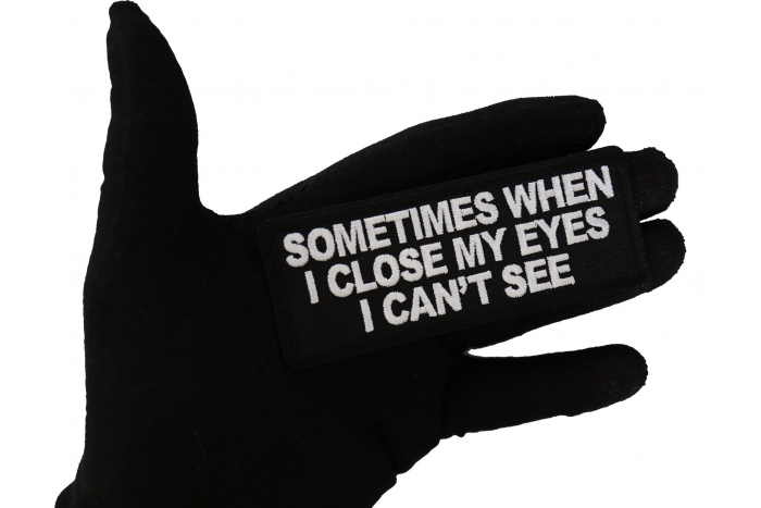 Sometimes When I close My Eyes I can't See Funny Iron on Patch shown on hand for size comparison