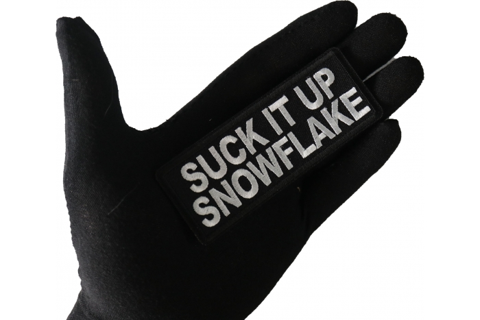 Suck it Up Snowflake Funny Iron on Patch shown on hand for size comparison