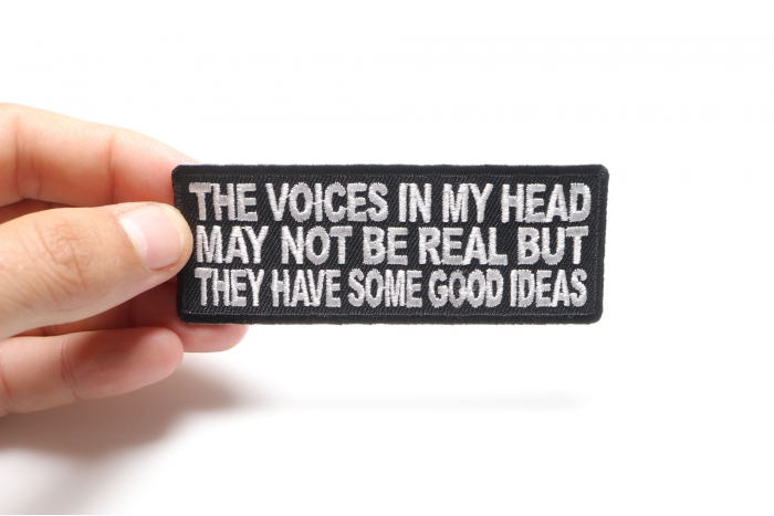 The Voices In My Head May Not Be Real Fun Funny Iron on Patch shown on hand for size comparison