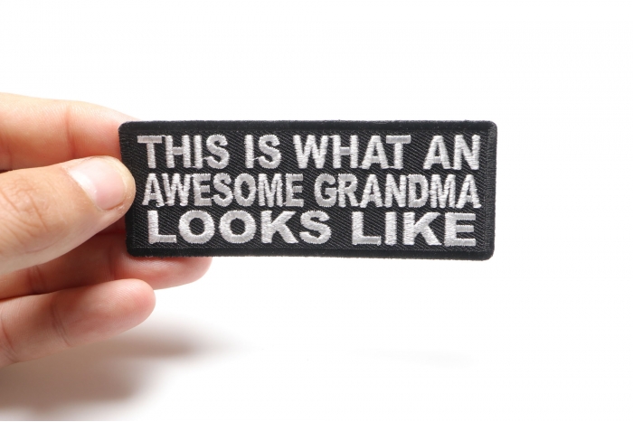 This Is What An Awesome Grandma Looks Like Patch, Funny Saying Patches shown on hand for size comparison