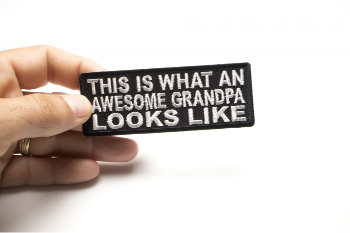 This Is What An Awesome Grandpa Looks Like Patch, Funny Saying Patches shown on hand for size comparison