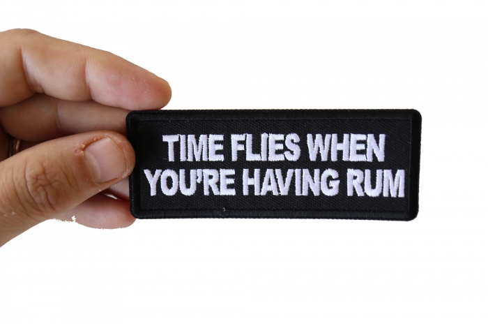 Time Flies when you are having Rum Funny Iron on Patch shown on hand for size comparison