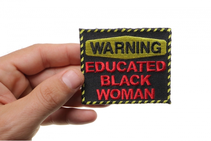 Warning Educated Black Woman Fun Funny Iron on Patch shown on hand for size comparison