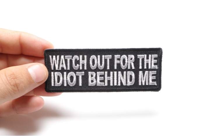 Watch Out For The Idiot Behind Me Patch, Funny Saying Patches shown on hand for size comparison