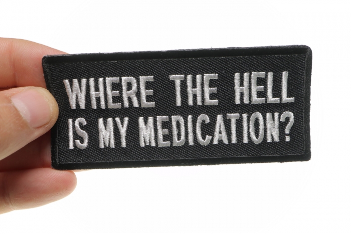 Where The Hell Is My Medication Funny Iron on Patch shown on hand for size comparison