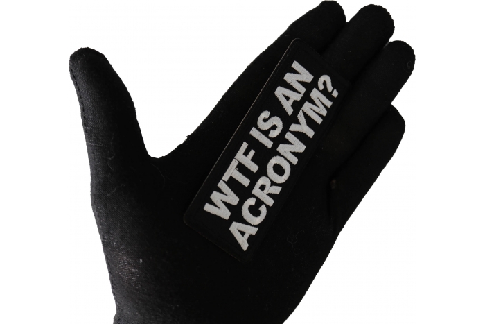 WTF is an Acronym Funny Iron on Patch shown on hand for size comparison