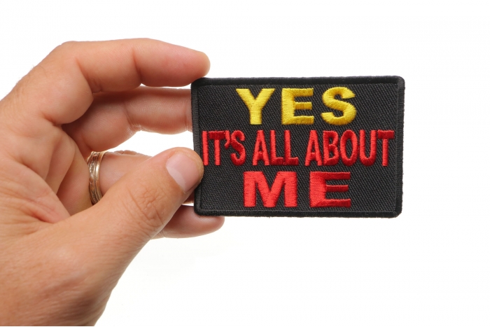 Yes It's All About Me Funny Iron on Patch shown on hand for size comparison