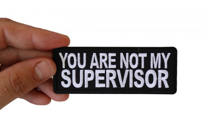 You are not my Supervisor Funny Iron on Patch shown on hand for size comparison