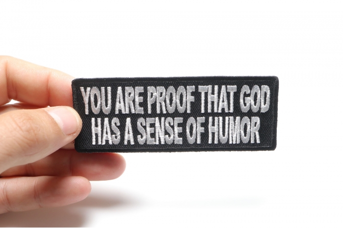 You Are Proof That God Has A Sense Of Humor Funny Iron on Patch shown on hand for size comparison