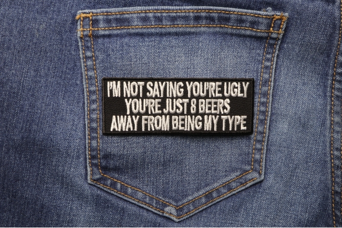 8 Beers Away From Being My Type Funny Saying Patch shown on jeans