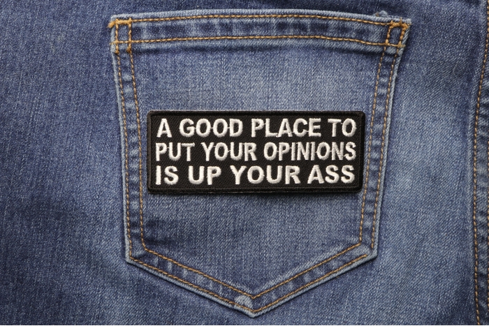 A Good Place To Put Your Opinions Is Up Your Ass Funny Iron on Patch shown on jeans