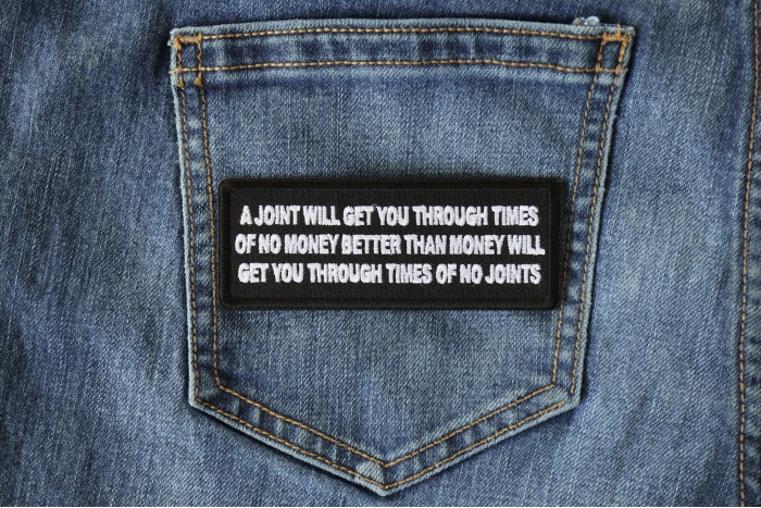 A Joint will get you through times of No Money Funny Iron on Patch shown on jeans