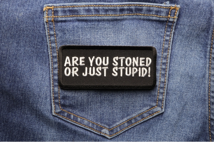 Are You Stoned or Just Stupid Funny Patch shown on jeans