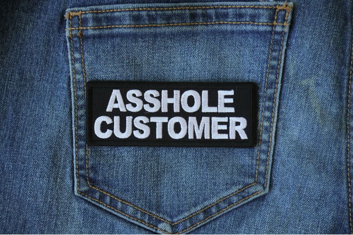 Asshole Customer Patch shown on jeans