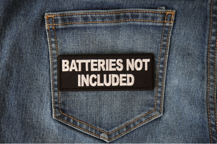 Batteries not Included Funny Iron on Patch shown on jeans