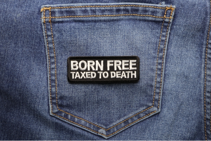 Born Free Taxed To Death Patch shown on jeans