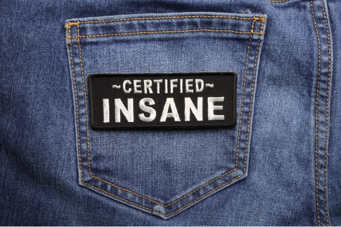Certified INSANE Funny Iron on Patch shown on jeans