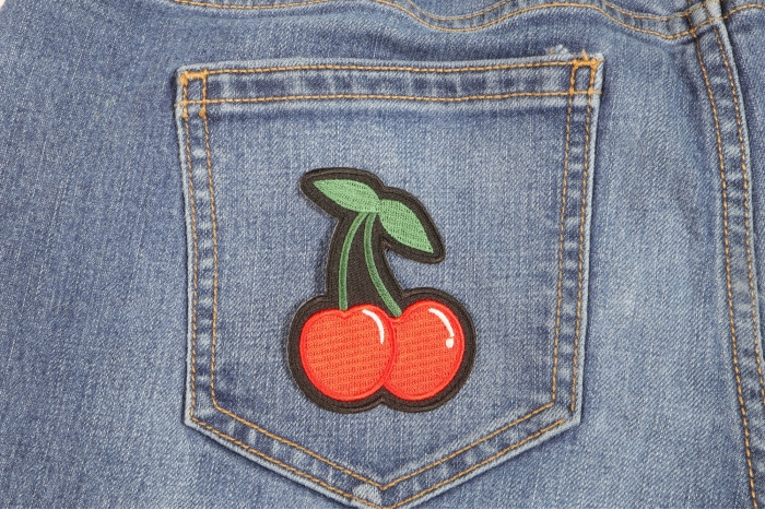 Cherry Funny Iron on Patch shown on jeans