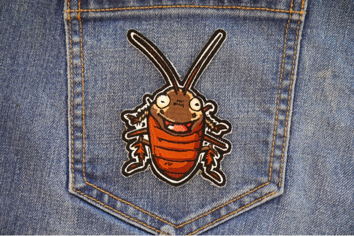 Cockroach Laugh Patch shown on jeans