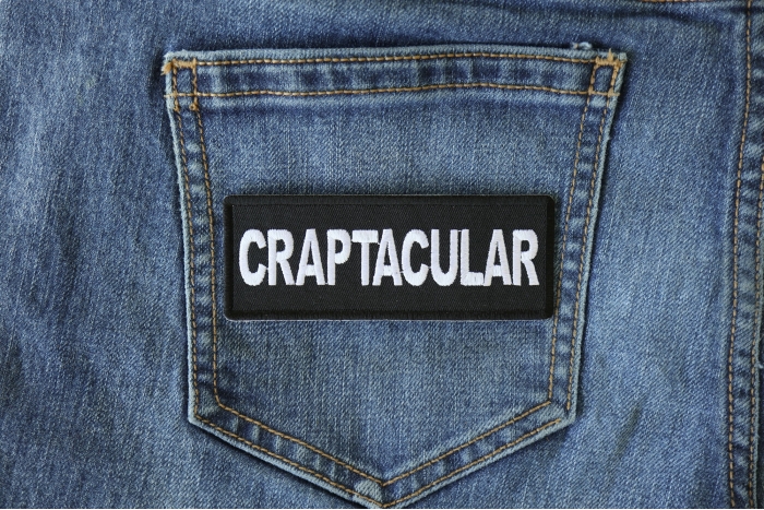 Craptacular Funny Iron on Patch shown on jeans
