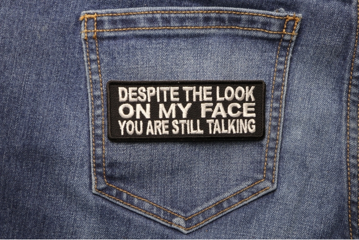 Despite The Look On My Face You're Still Talking Funny Iron on Patch shown on jeans