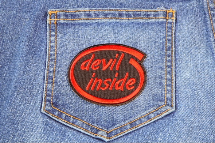 Devil Inside Funny Iron on Patch shown on jeans