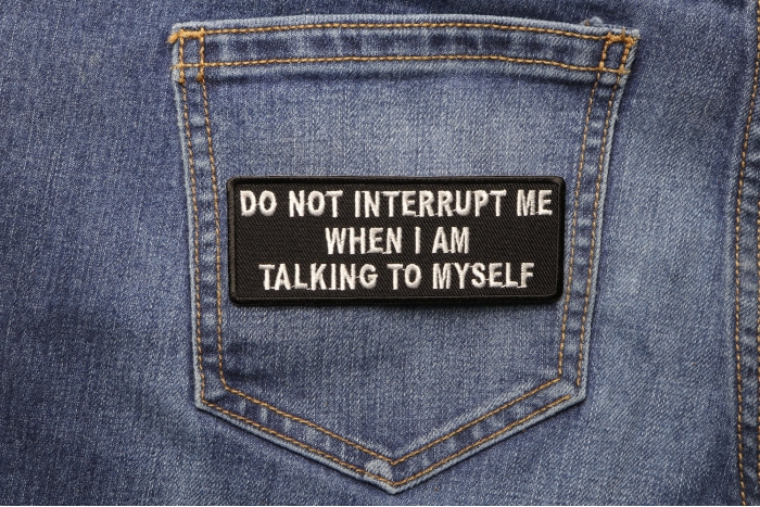 Do Not Interrupt Me When I Am Talking To Myself Patch shown on jeans