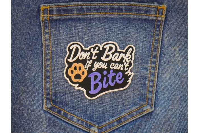 Don't Bark if you can't Bite Patch shown on jeans