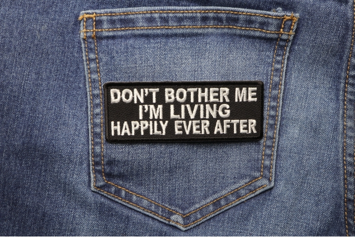 Don't Bother Me I'm Living Happily Ever After Funny Patch shown on jeans